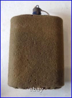 Rare gourde Néo-Zélandaise avec sa housse, étiquette du fabriquant. WW. 2